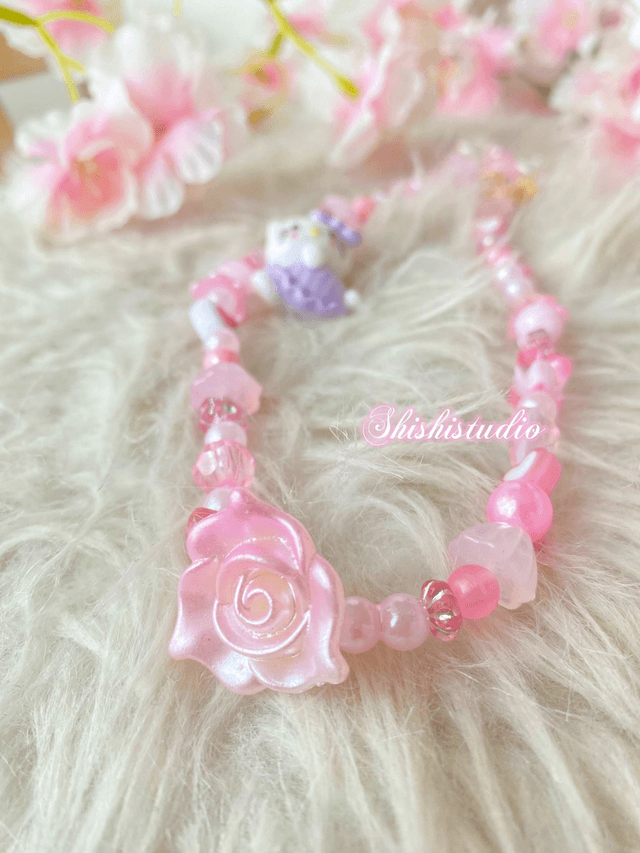 Hello Kitty purple bracelet phone strap