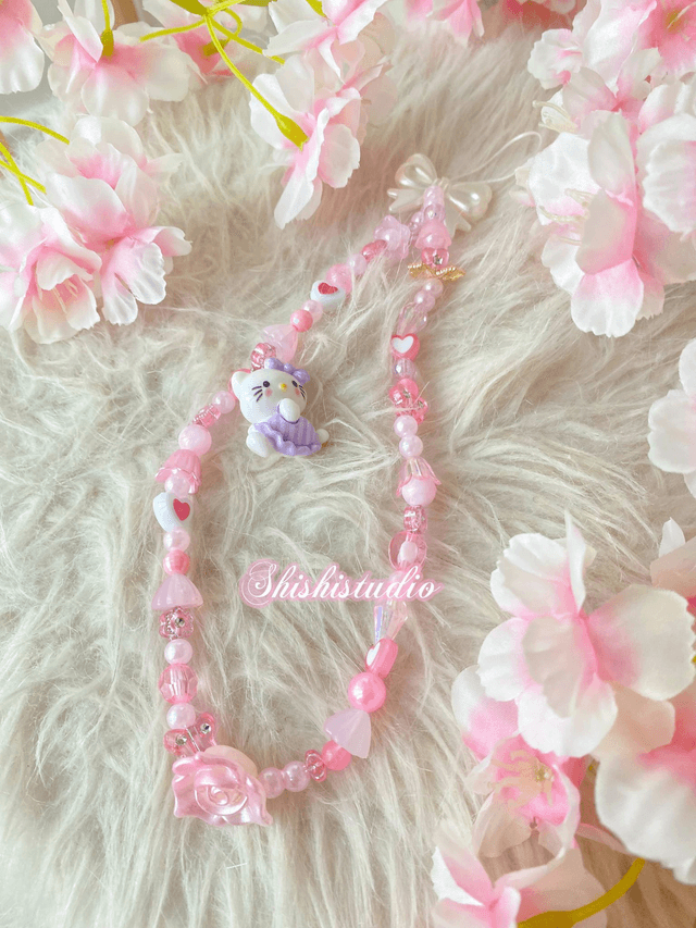 Hello Kitty purple bracelet phone strap