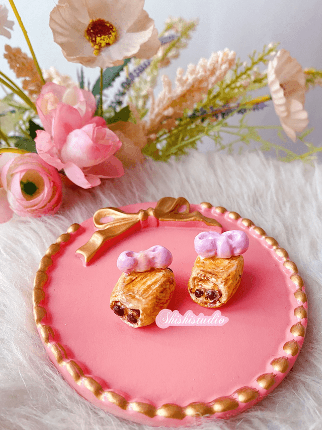 Miniature pain au chocolat chopsticks/brush rest