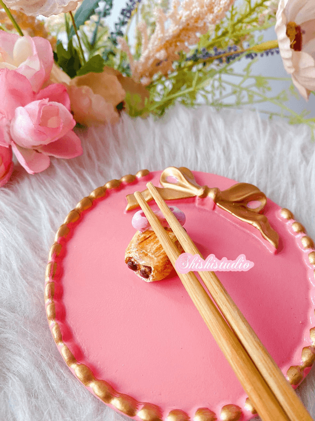 Miniature pain au chocolat chopsticks/brush rest