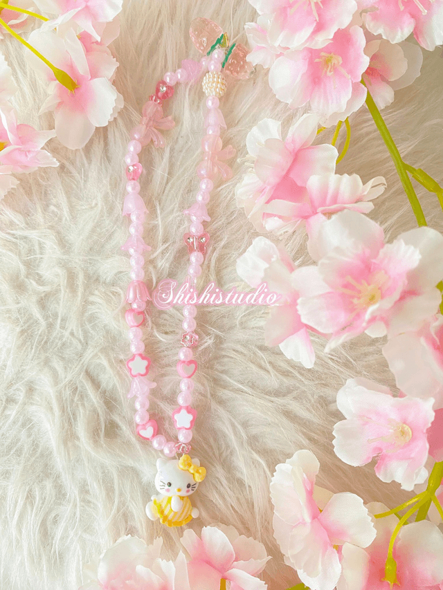 Hello Kitty yellow bracelet phone strap 