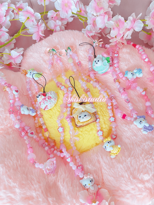 Hello Kitty purple bracelet phone strap