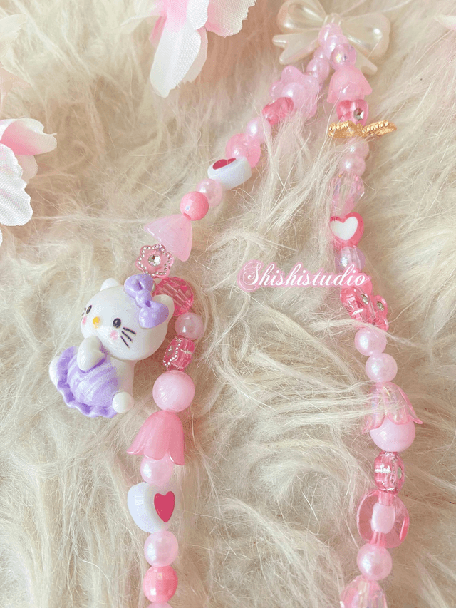 Hello Kitty purple bracelet phone strap