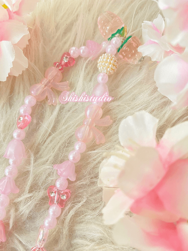 Hello Kitty yellow bracelet phone strap 